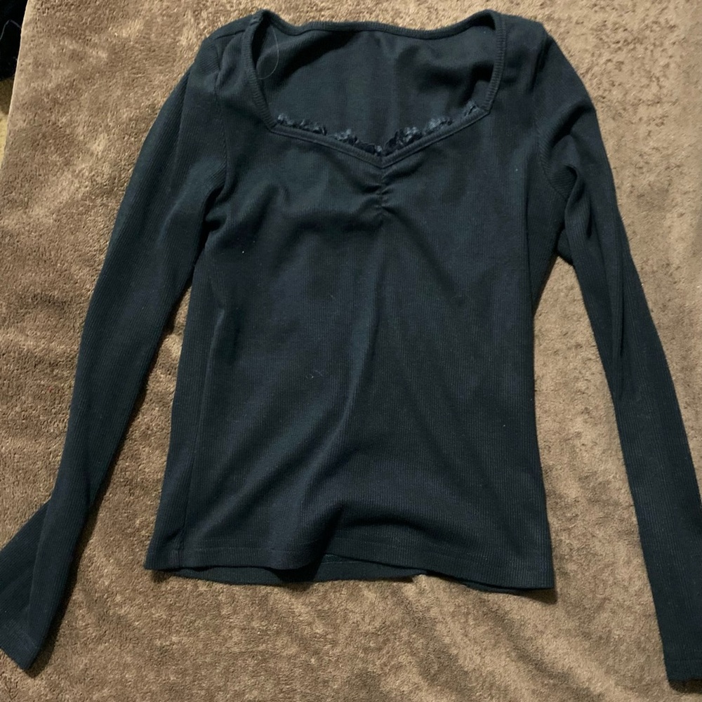 Black long sleeve shirt with lace around neck line